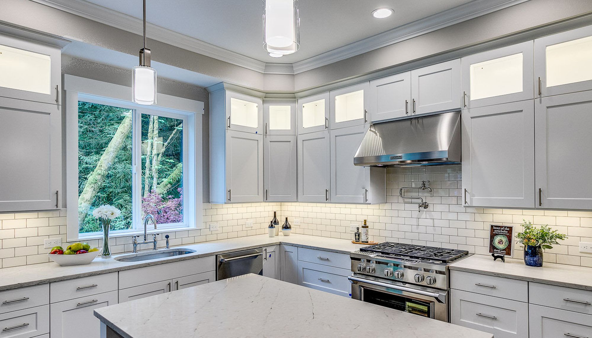 Harbor Custom Homes luxury kitchen with white cabinets and stainles appliances